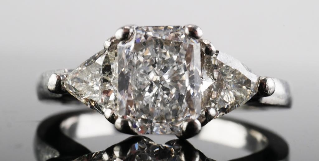 Appraisal: Platinum engagement ring featuring a carat colorless diamond The cut-cornered