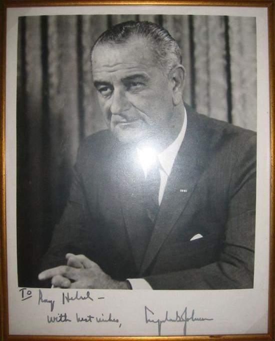 Appraisal: JOHNSON LYNDON B Photograph Signed and Inscribed To Ray Helsel