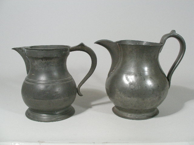 Appraisal: Two Early Pewter Water Pitchers two early pewter water pitchers