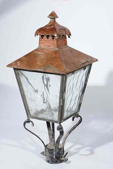 Appraisal: A COPPER AND IRON FULL GLASS LANTERN of pagoda form