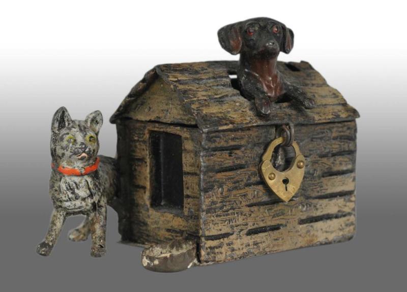 Appraisal: Lead Dog in Doghouse Cat Still Bank Description German All