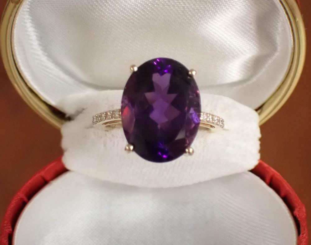 Appraisal: AMETHYST DIAMOND AND FOURTEEN KARAT GOLD RING with a row