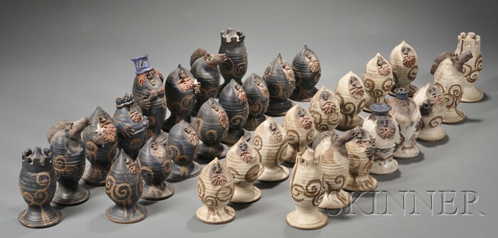 Appraisal: Davis Stoneware Chess Set Hand-thrown decorated glazed earthenware Late th