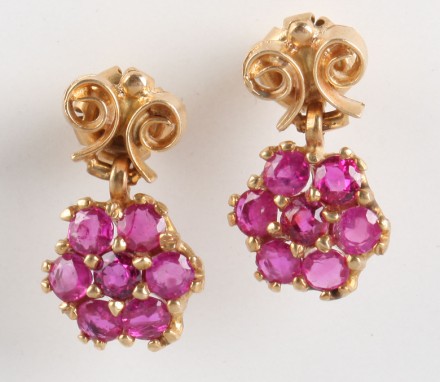 Appraisal: K cluster drop ruby earrings fourteen mm round rubies gold