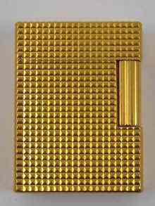 Appraisal: A gold plated Dupont gas cigarette lighter