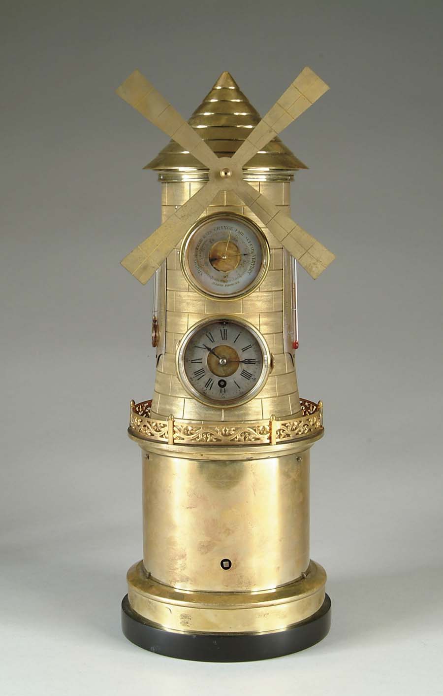 Appraisal: WINDMILL INDUSTRIAL CLOCK Outstanding windmill shaped clock has clock face