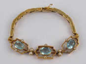 Appraisal: A carat gold aquamarine and seed pearl expanding bracelet largest