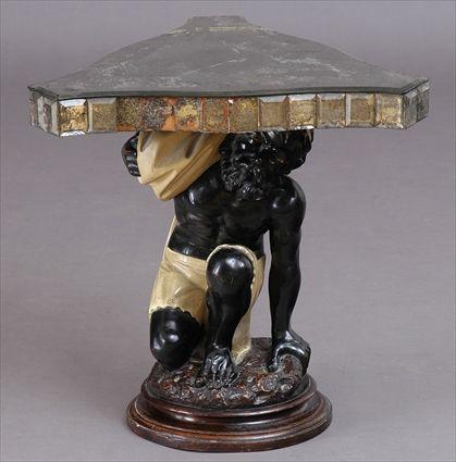 Appraisal: VENETIAN ROCOCO-STYLE BLACKAMOOR TABLE The serpentine triangular mirrored top on