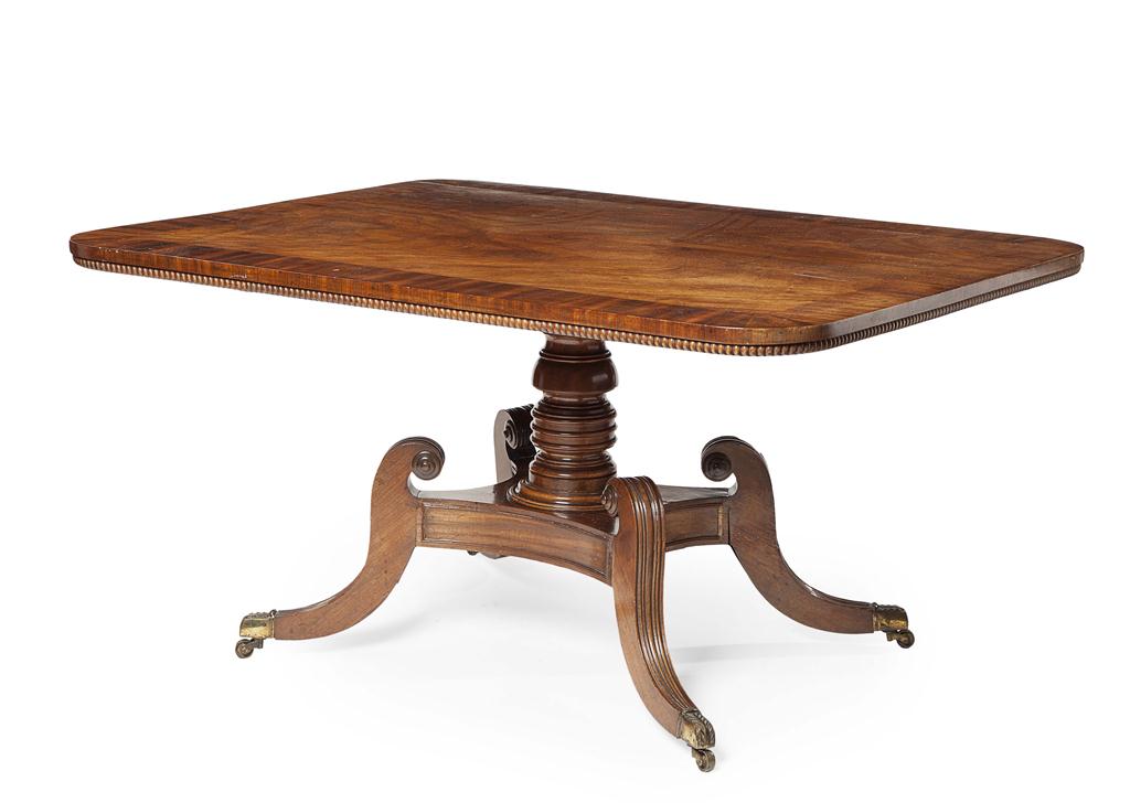 Appraisal: REGENCY MAHOGANY BREAKFAST TABLE EARLY TH CENTURY the crossbanded rounded