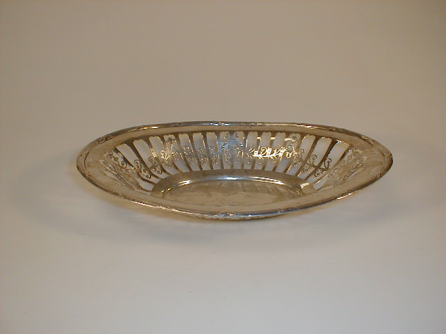 Appraisal: A George V silver oval basket the everted rim with