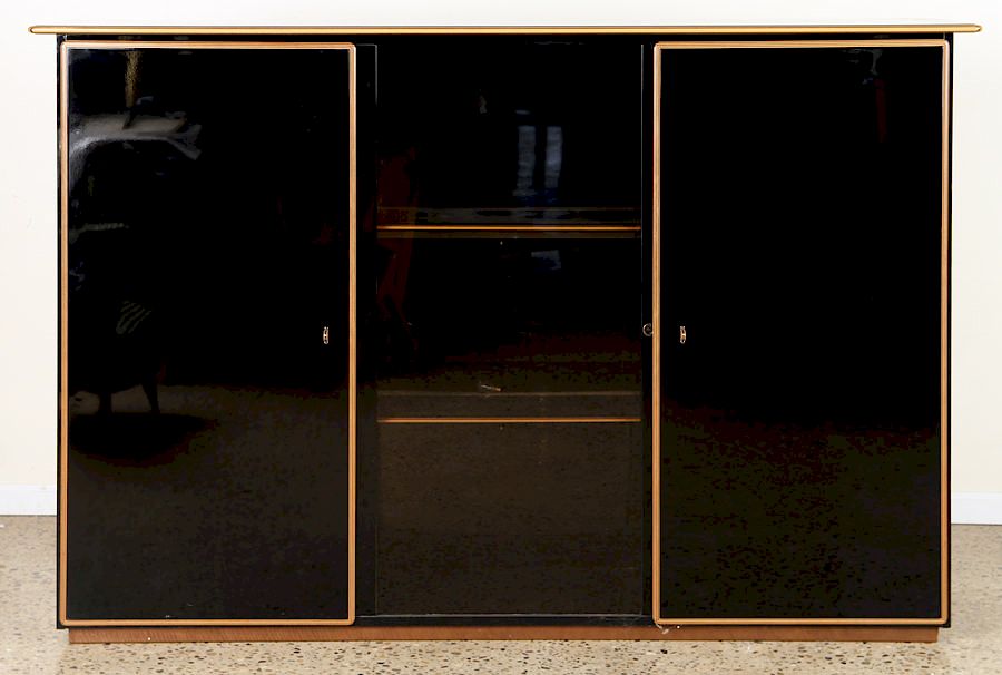 Appraisal: EBONIZED THREE DOOR CABINET BY TOBIA SCARPA An ebonized three