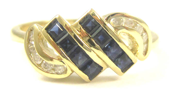 Appraisal: SAPPHIRE DIAMOND AND FOURTEEN KARAT GOLD RING set with eight