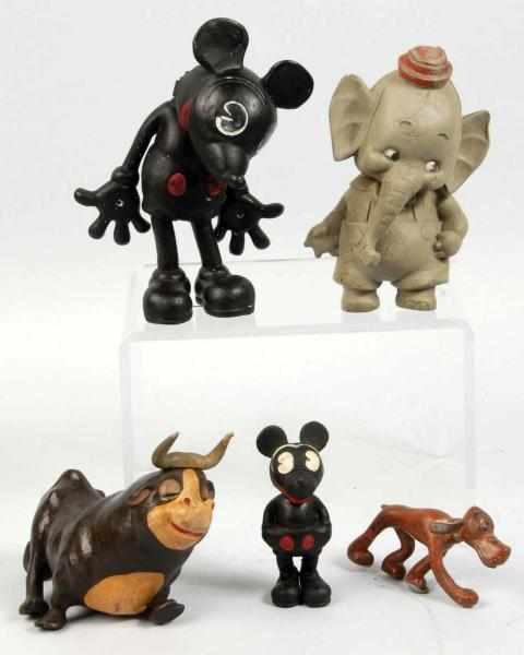 Appraisal: Lot of Rubber Walt Disney Figures Description Includes two Mickey