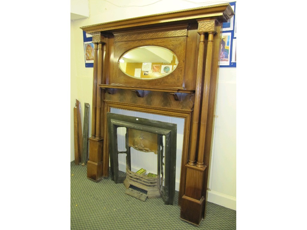 Appraisal: Mahogany mirror back fire surround with twin reeded columns Art