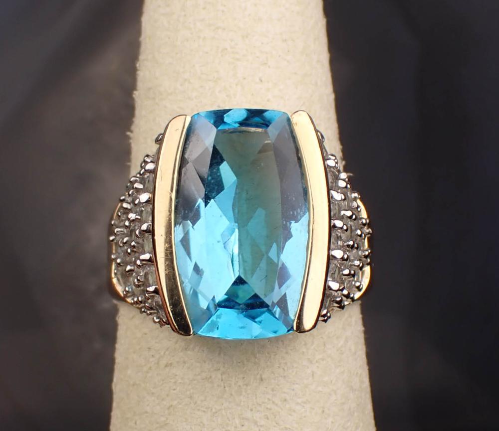 Appraisal: BLUE TOPAZ AND FOURTEEN KARAT GOLD RING The yellow and