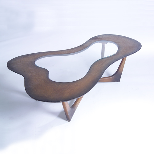 Appraisal: MODERN Biomorphic coffee table with inset plate glass top on