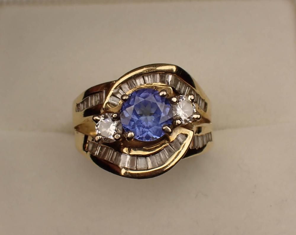 Appraisal: TANZANITE DIAMOND AND FOURTEEN KARAT GOLD RING The yellow gold