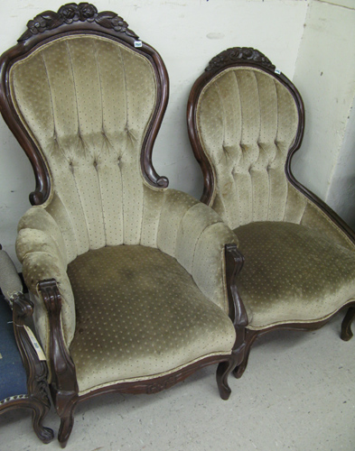 Appraisal: TWO AMERICAN VICTORIAN STYLE ARMCHAIRS ladies' and gentlemen's versions with