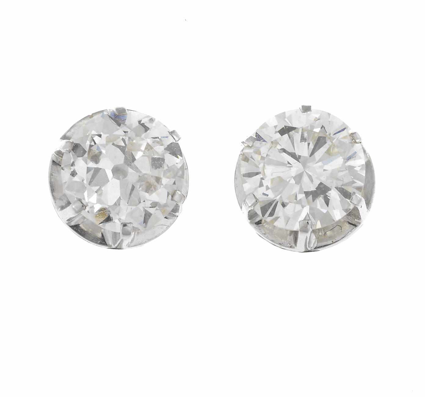 Appraisal: A pair of diamond solitaire screwback earrings round brilliant and