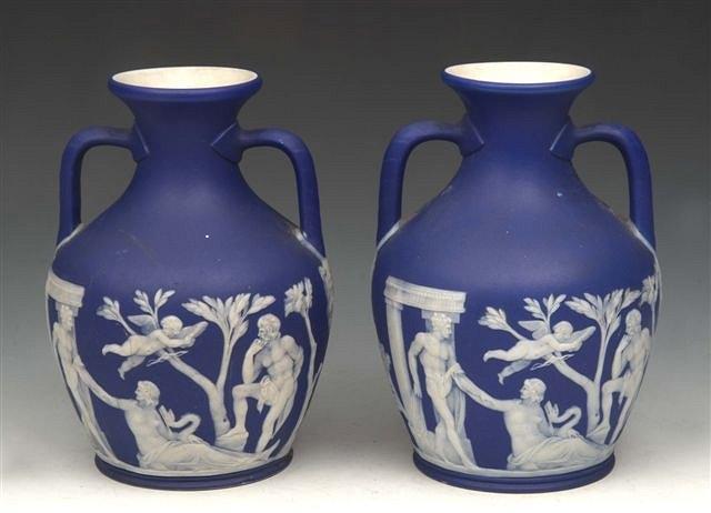 Appraisal: A PAIR OF WEDGWOOD BLUE JASPER PORTLAND VASES with classical