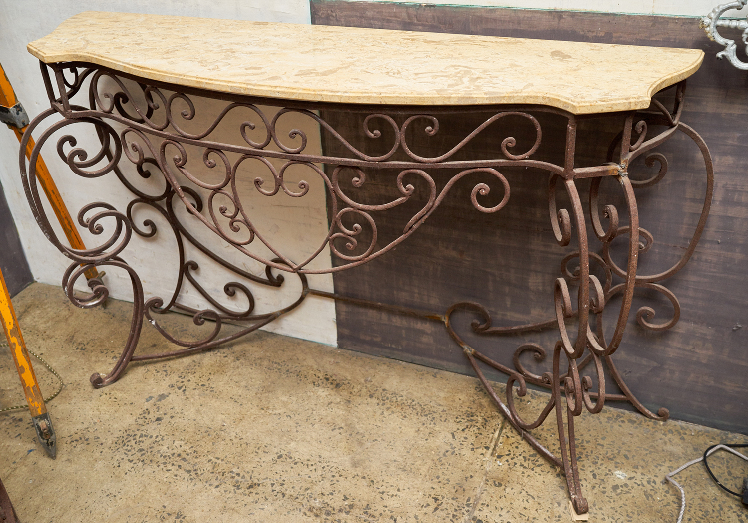 Appraisal: A DECORATIVE FRENCH WROUGHT IRON CONSOLE Italian marble top h