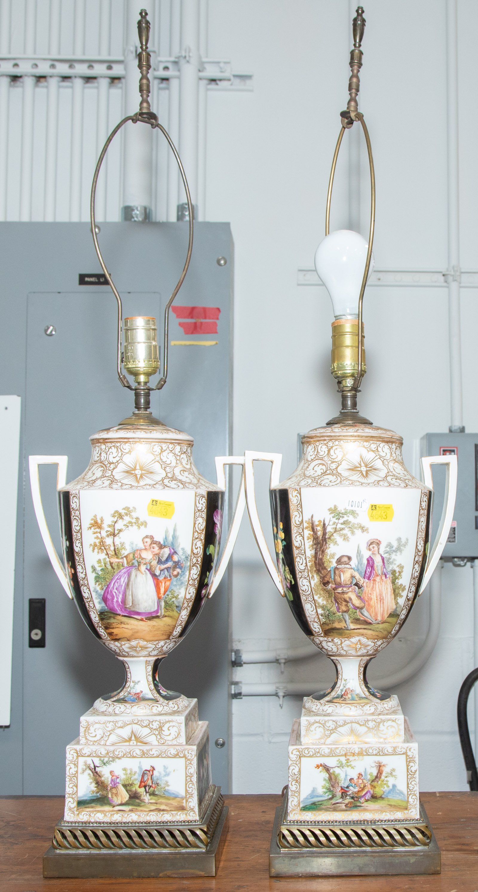 Appraisal: A PAIR OF GERMAN PAINTED GILT URN-FORM LAMPS Early th