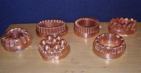 Appraisal: A group of six various th century copper jelly moulds