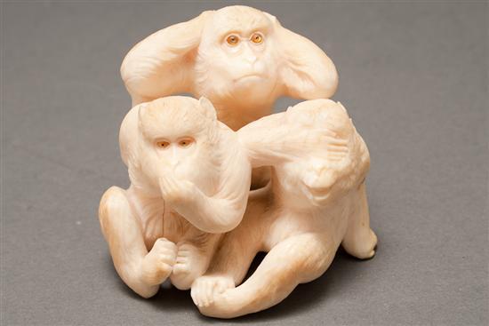 Appraisal: Japanese carved ivory figural group depicting the three wise monkeys