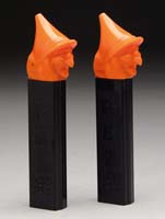 Appraisal: PAIR OF WITCH PEZ DISPENSERS Orange and black containers with