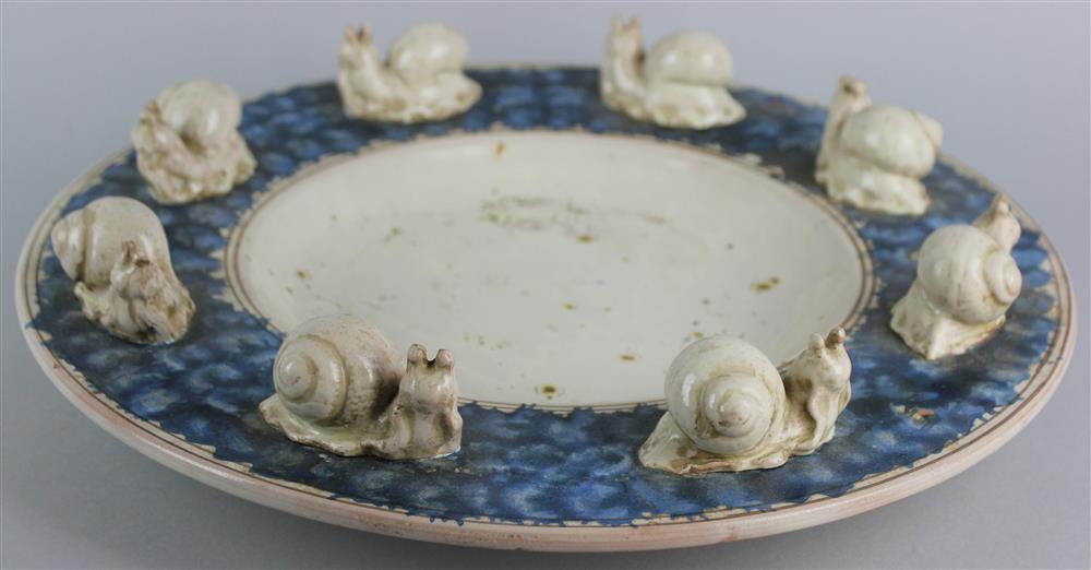 Appraisal: ITALIAN GLAZED CERAMIC SNAIL CENTERPIECE BOWL circular with a wide