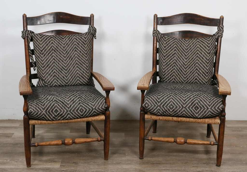 Appraisal: Pair of Shaker style ladderback lounge chairs th Century Carved