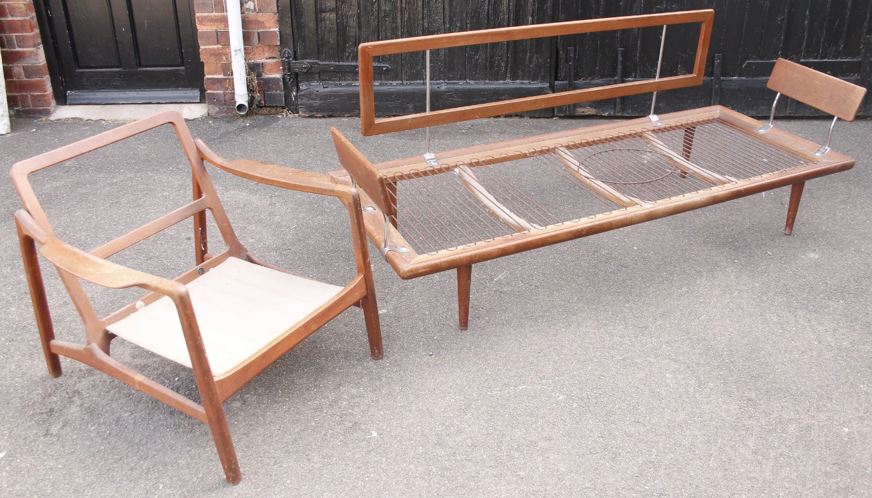 Appraisal: An F F retro design teak finish lounge suite comprising