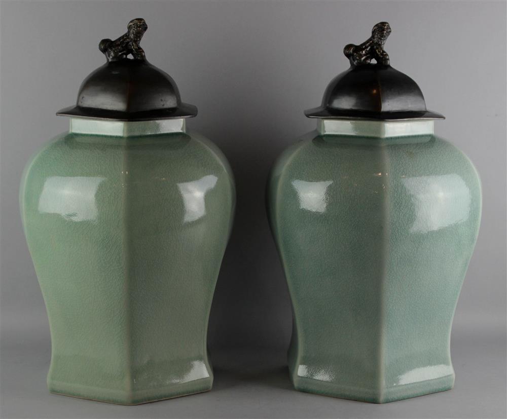 Appraisal: PAIR OF CHINESE CRACKLED-CELADON-GLAZED OCTAGONAL JARS AND COVERS the high-shouldered