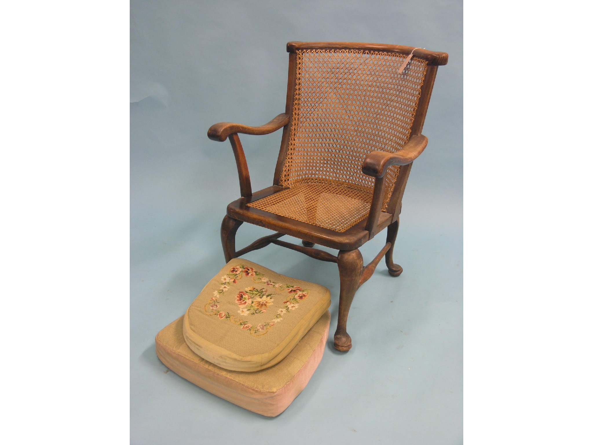 Appraisal: A beech elbow chair with caned seat and back on