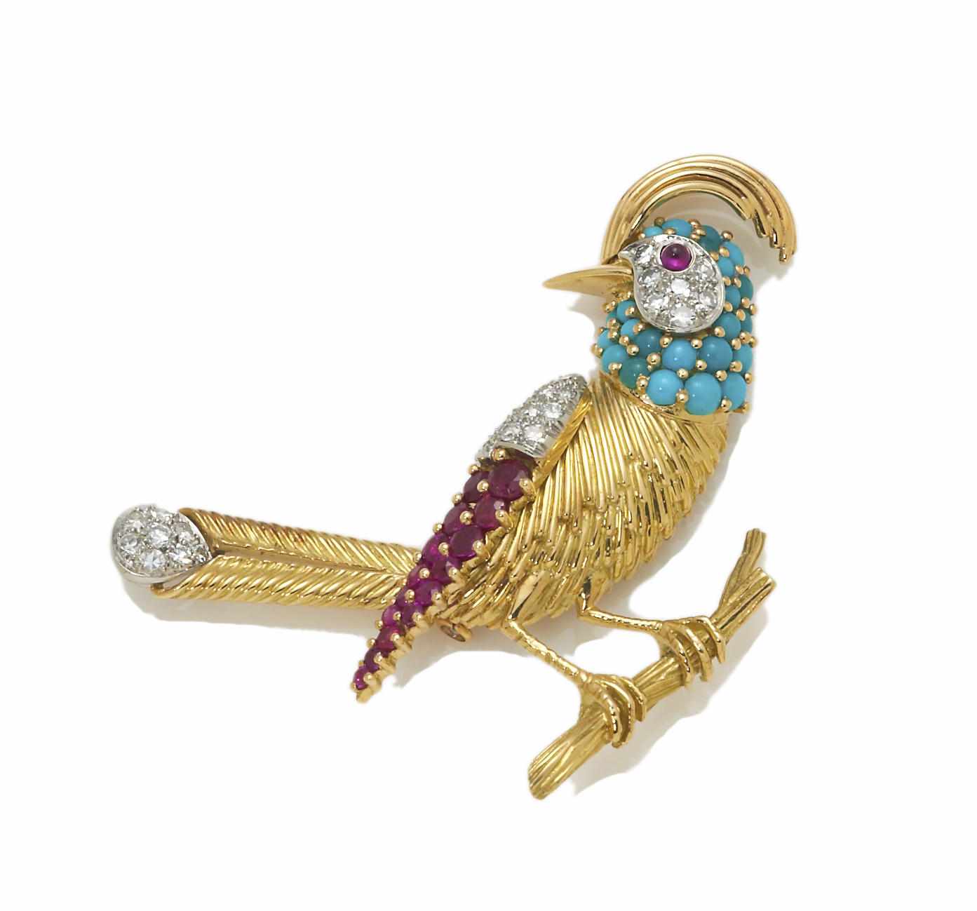 Appraisal: A diamond ruby and turquoise bird brooch mounted in fourteen