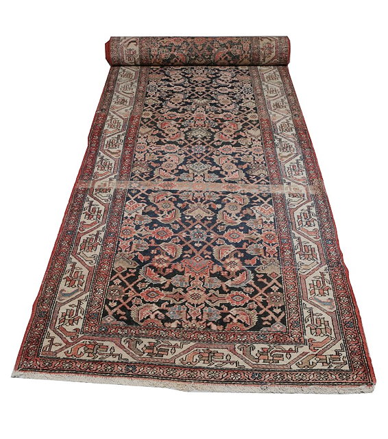 Appraisal: A BIDJAR BLUE GROUND LONG RUNNER with continuing foliate scroll