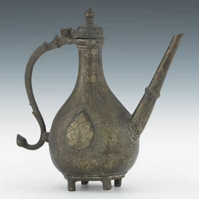 Appraisal: Metal Ewer Mughal Indian ca th Century Possibly brass hand