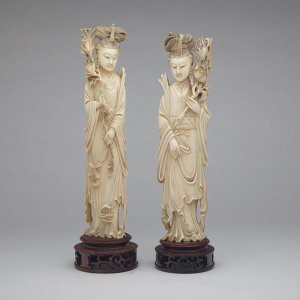 Appraisal: Pair of Ivory Carved Beauties Circa s Carved ivory figure