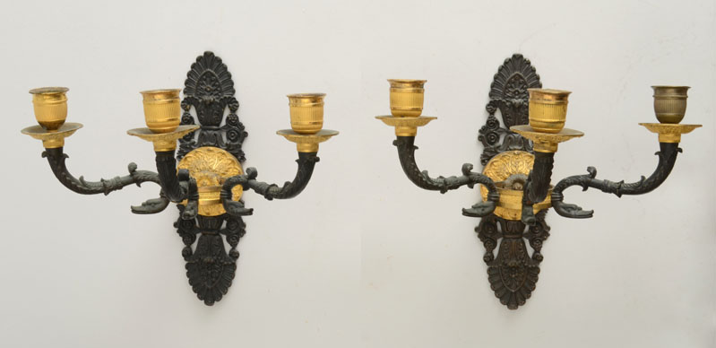 Appraisal: PAIR OF EMPIRE STYLE BRONZE AND GILT-METAL THREE-LIGHT SCONCES Each