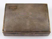 Appraisal: A silver cigarette case with domed engine turned lid x