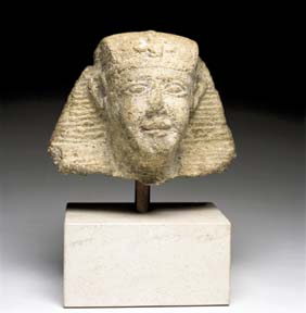 Appraisal: EGYPTIAN LIMESTONE HEAD Well carved Egyptian limestone head wearing the