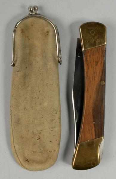 Appraisal: Buck Lock Back Folding Hunter Knife Description Circa Buck Model