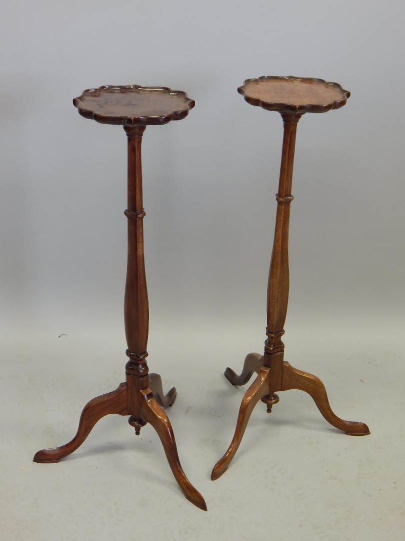 Appraisal: A pair of George III style torcheres each with a