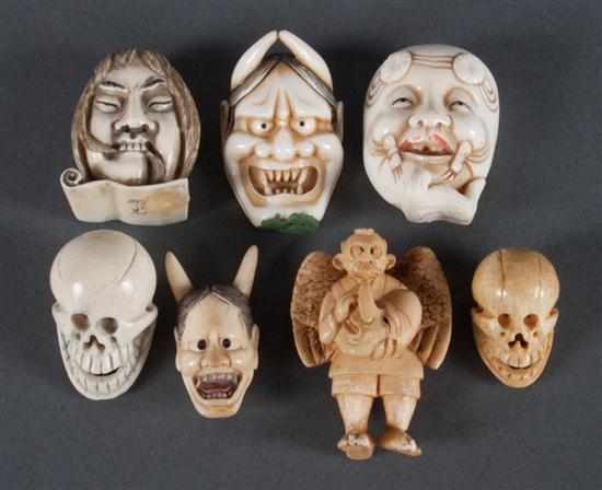 Appraisal: Seven Japanese carved ivory demon and skull-form netsukes figures include