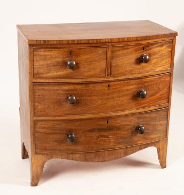 Appraisal: A Regency mahogany bowfront chest the top fitted two long