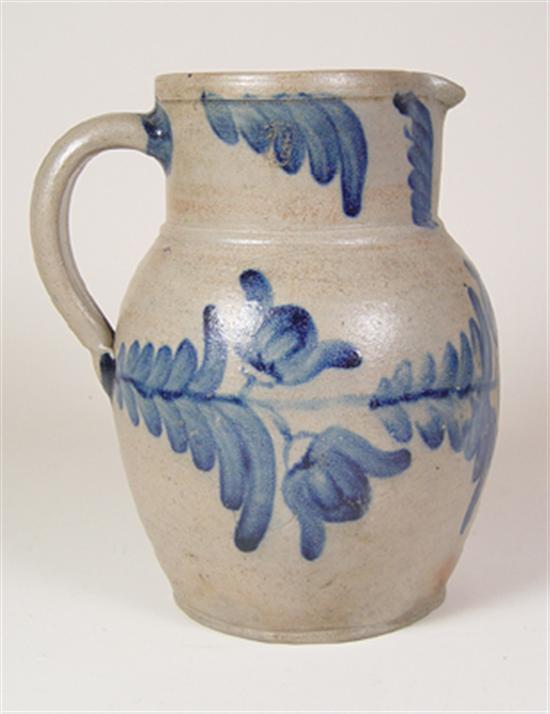 Appraisal: American Stoneware Pitcher Extensive foliate decoration with tulips large restored