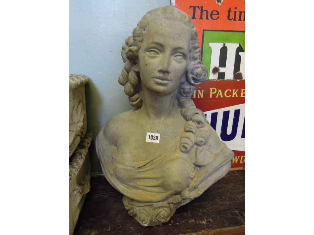 Appraisal: A cast composition stone bust of a classically draped maiden