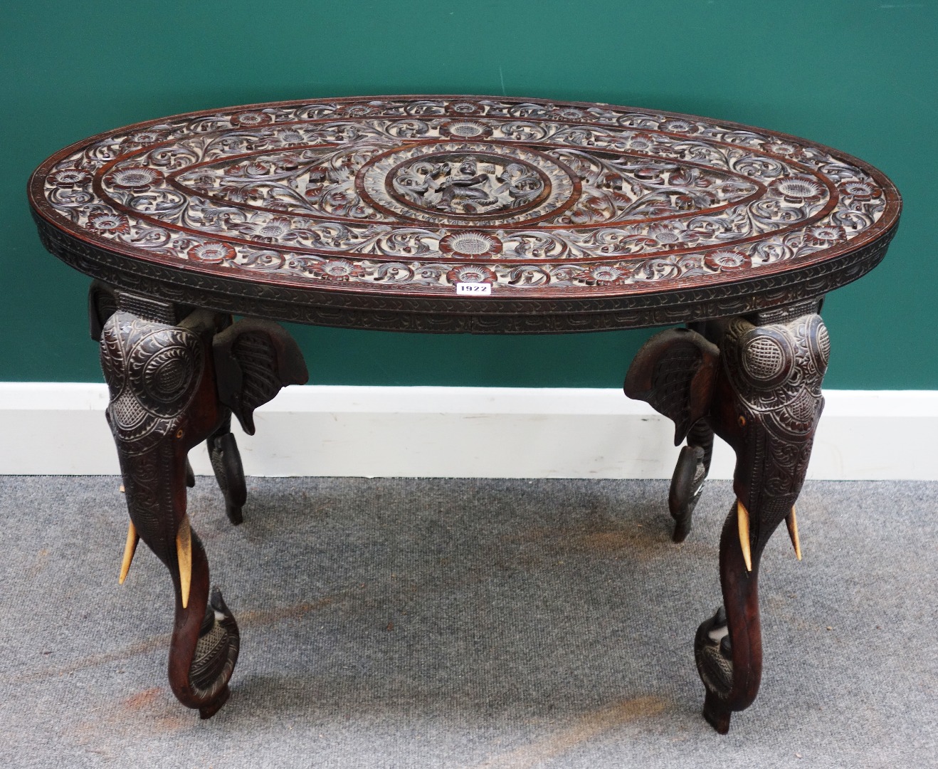 Appraisal: An early th century Indian carved hardwood oval occasional table