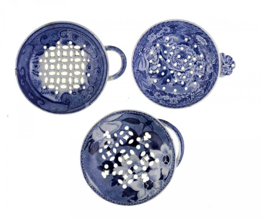 Appraisal: THREE BLUE PRINTED EARTHENWARE EGG DRAINERS comprising Minton Monk's Rock