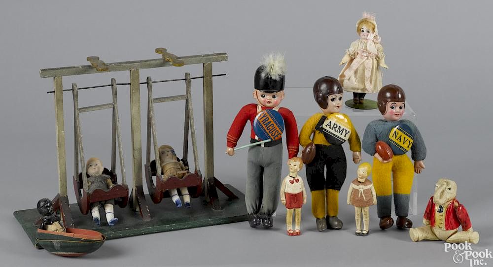 Appraisal: Celluloid figures and toys to include three dressed souvenir celluloid